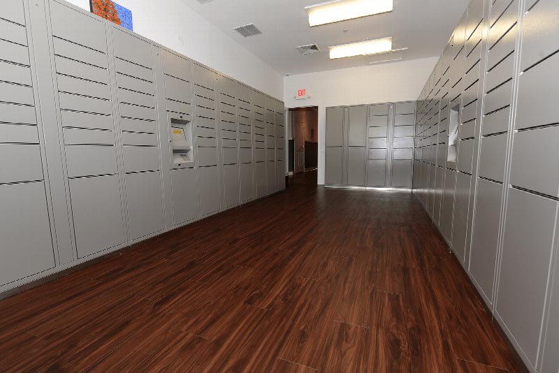 Photo of the secure package delivery room for tenants inside the Harbortown clubhouse.