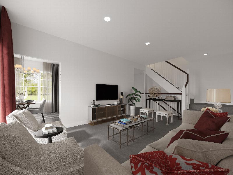 Suites at Sun Valley rendering of a living room showing a large sectional couch and several chairs, an entertainment console with large screen TV.oom