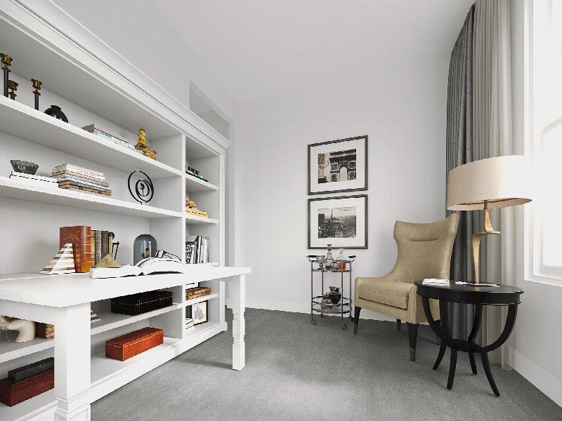 Suites at Sun Valley rendering of a den showing a desk and a large book case. There is a sitting chair and table in the corner, and a window to allow for natural light.