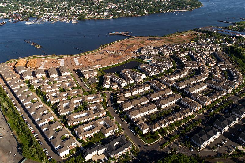 Overhead aerial photograph showing the entire Harbortown development site and the waterfront.