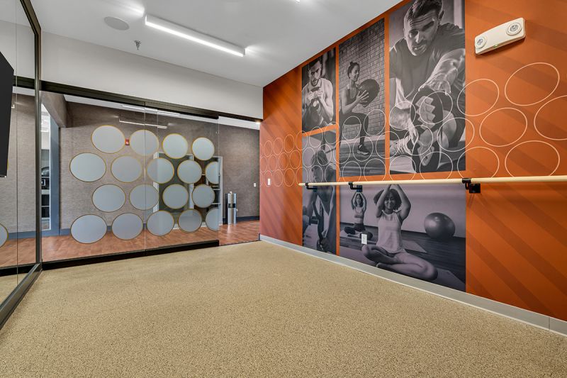 Interior photo of the movement studio inside the clubhouse at Ewing Town Center for yoga and stretching.