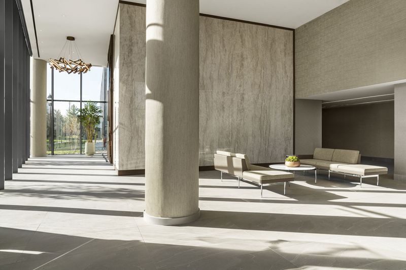 Interior photo of the entry floor lobby showing spacious area with luxury seating