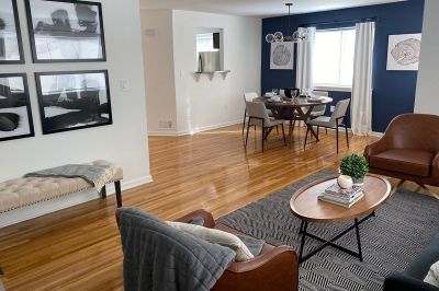 Edison Woods photo showing a spacious living room with hardwood floors and a separate dining area.
