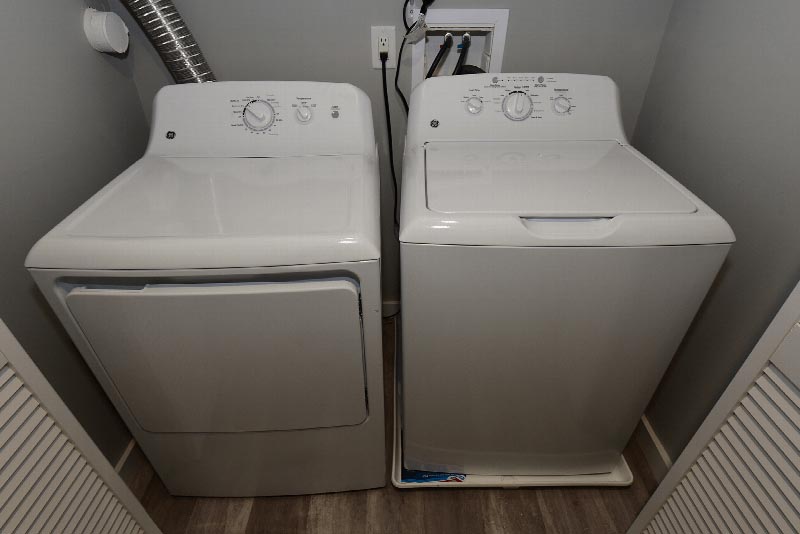 Sun Valley Plaza photo of the full size washer and dryer that comes within the apartment.