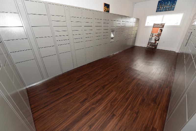 Photo of the secure package delivery room for tenants inside the Harbortown clubhouse.