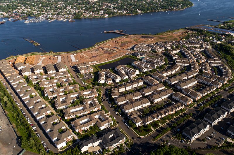Overhead aerial photograph showing the entire Harbortown development site and the waterfront.