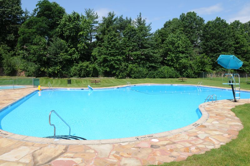 Woodbridge Center Plaza photo of the community swimming pool on a sunny day.