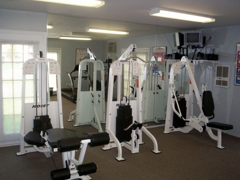 Woodbridge Center Plaza image of some of the gym equipment, featuring several strength training machines.