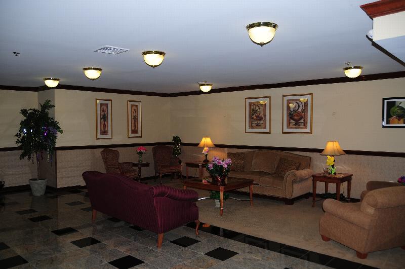 Park Terrace photo of a community lounge area showing a large sitting area with several couches and multiple chairs.