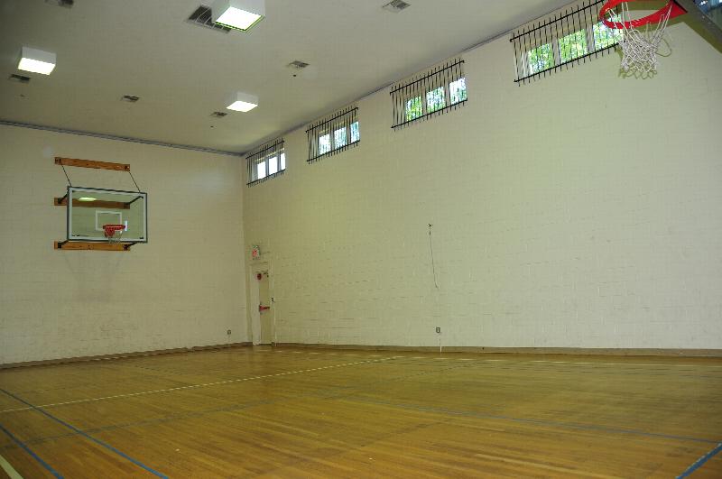 Pike Run Affordable Basketball Court photo showing a full size indoor basketball court.