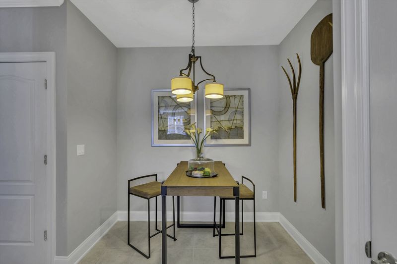 Interior Photo of the model at Princeton Terrace at West Windsor showing the eat-in kitchen nook with table and chairs