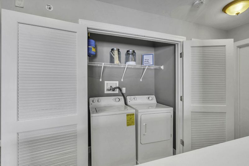 Interior Photo of the model at Princeton Terrace at West Windsor showing a full size washer and dryer.