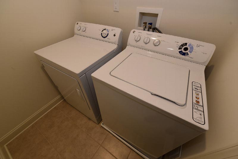 Village at Sun Valley photo of the in unit full sized washer and dryer.
